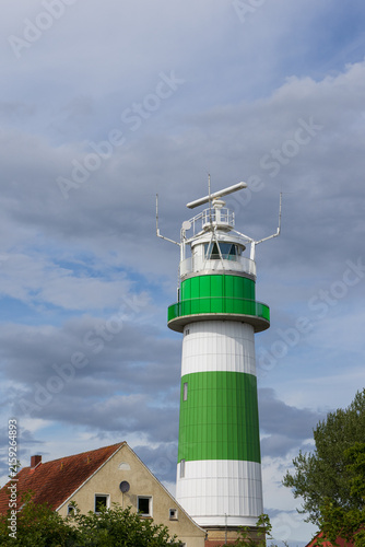 Traditional Buelk lighthouse in portait format.