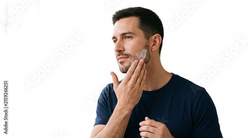 Man applying shaving cream to his beard for a smooth shave