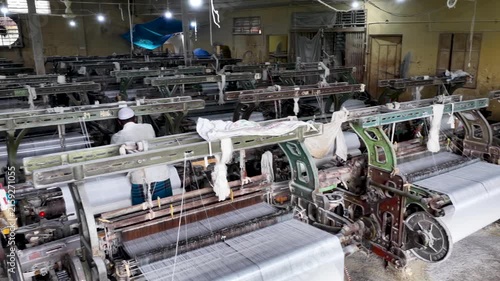 Textile Weaving Factory With Rows Of Power Looms