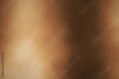 Abstract beige gradient wallpaper featuring soft warm light for modern digital screen and creative design projects