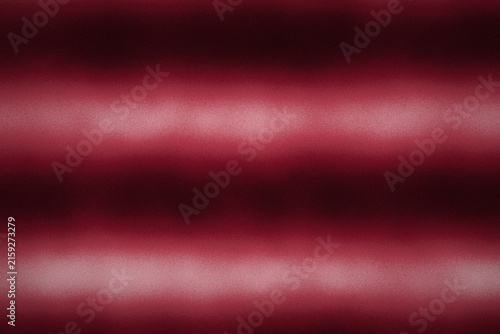Abstract deep red gradient background with textured grain for elegant graphic design and art projects