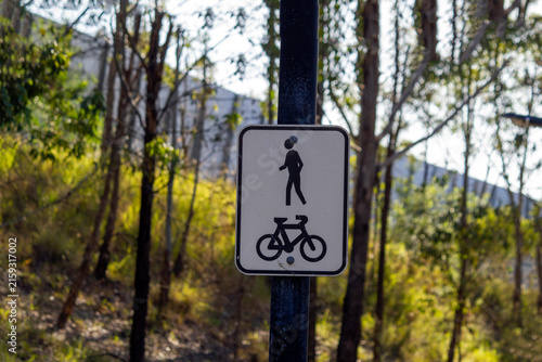 Street or road sign indicating a shared area for pedestrians and cyclists in Sydney, New South Wales, Australia. Shared paths are great spaces where everyone can interact and enjoy the great outdoors.