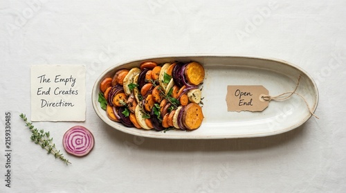 Roasted root vegetables in a minimalist ceramic dish with conceptual handwritten notes about composition and direction, showcasing creative food photography and healthy eating habits for designers...