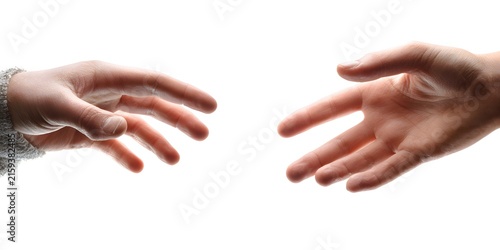 A persons hand reaches out toward another hand against a clean white background.