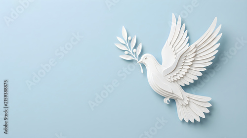 White dove holding an olive branch on a light blue background for international peace day celebration