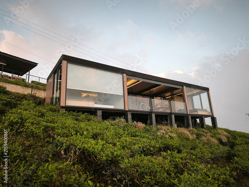 Glass Restaurant Building on Hillside at Dusk in Highlands