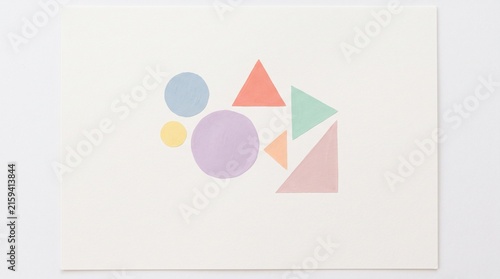 Minimalist pastel geometric shapes on soft pink background for modern design projects