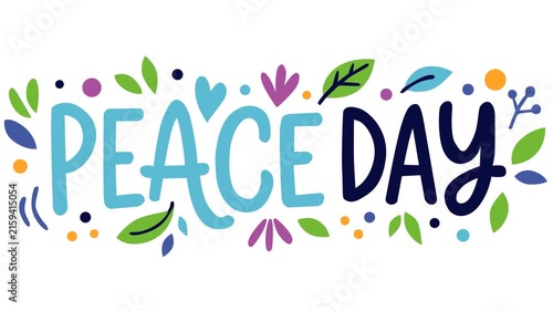 Animated Peace Day footage featuring bold peace lettering surrounded by colorful leaves, hearts, flowers, and dots on a white background, symbolizing harmony, unity, hope, friendship, and goodwill