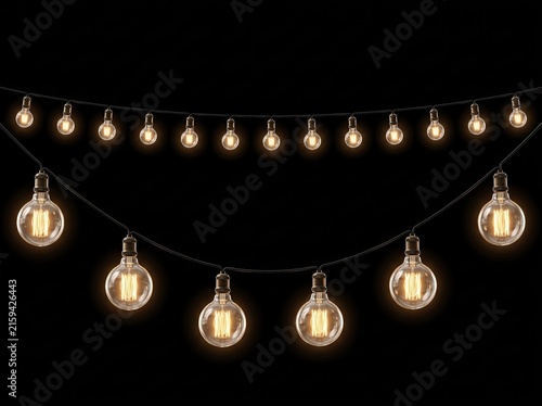 Glowing vintage edison light bulbs string lights on black background