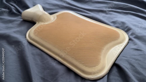 Hot water bottle heating portable device in the winter to warm up