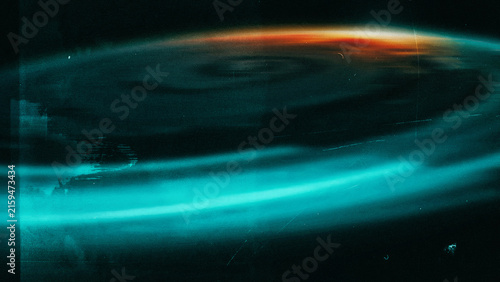 Glowing spiral with bright blue light and dust particles
