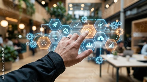 Businessman touching futuristic digital interface with hexagonal icons gears, for advanced technology, strategic business planning, innovative corporate network solutions