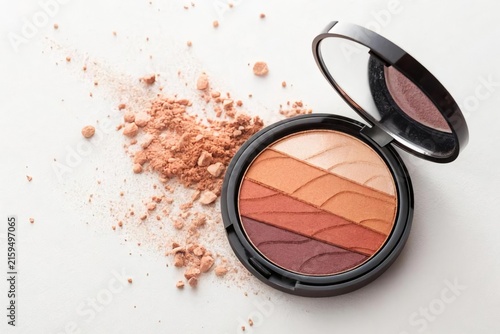 Vibrant Makeup Palette with Blush and Powder Product on White Background