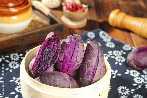 Purple Sweet Potatoes in Wooden Bowl - Healthy Vegetarian Cooking Ingredients