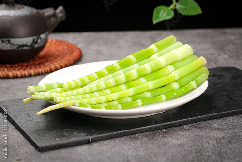 Obraz na plátně Fresh bamboo shoots on plate - Asian cuisine ingredient ready for cooking