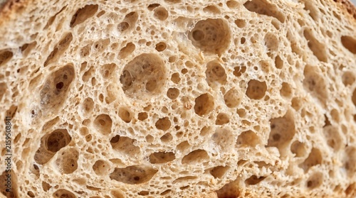 Macro Close-Up Of Artisanal Sourdough Bread Crumb Texture With Air Holes