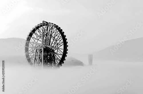 Quadro su tela Ferris Wheel in Fog - Surreal City Landscape