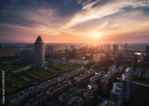 Konstfotografi City Skyline at Sunset - Aerial Urban Landscape with Modern Architecture