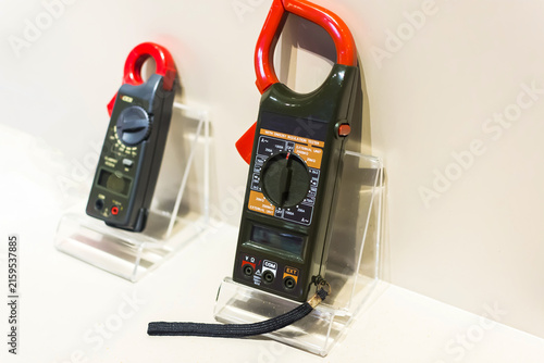 Obraz na płótnie Portable clamp voltmeters on display stands for electrical testing