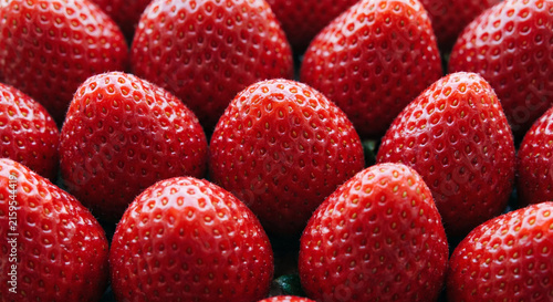 Macro Close Up of Fresh Ripe Red Strawberries Background Texture