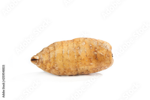 Foto Fresh Raw Potato with Natural Skin Texture Isolated on White Background