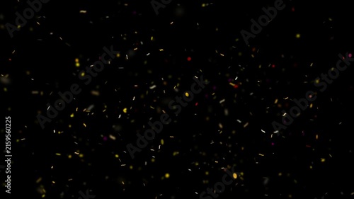 Golden confetti particles float across a dark black background creating a festive abstract sparkle effect.