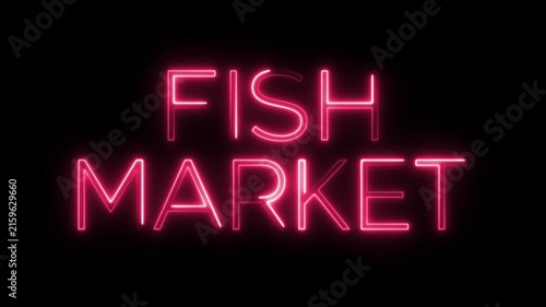 Neon fish market signage glowing with flickering pink light on dark wall.