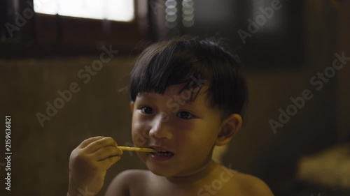 Toddler Eating Biscuit Stick At Home