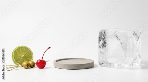 Fresh Ingredients for Cocktails with Bright Fruits and Ice on Light Background