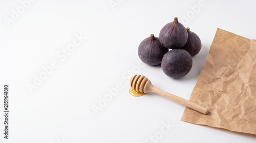 Fresh Figs and Honey on Brown Paper Background with Natural Light and Shadow