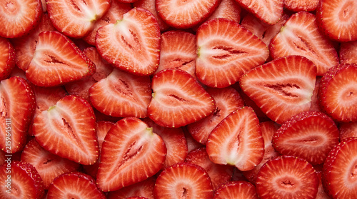 Top View Macro Background of Ripe Sliced Red Strawberries