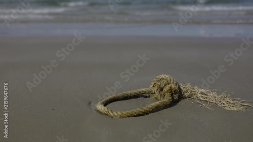 Broken Marine Rope Abandoned On The Sandy Beach