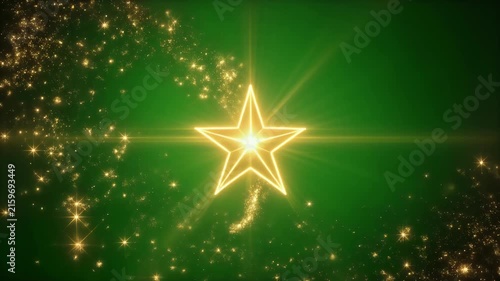 A bright star trails golden glitter across a green background.