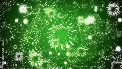 Bright white fireworks explode against a gradient green background.