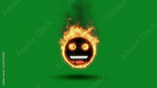 A smiley face emoji engulfed in flames with a green screen background.