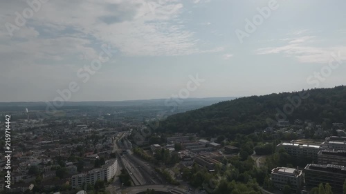 Aerial view of Swiss city of Zürich on a summer morning with skyline and cityscape with scenic landscape. Video shot August 15th, 2026, Zurich, Switzerland.