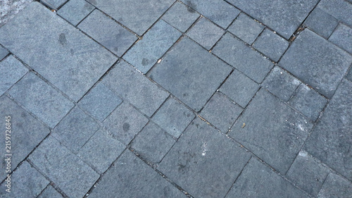 Fotografie High angle close up of grey stone paver sidewalk texture