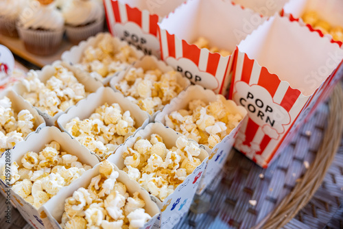Vintage popcorn containers prepared for film viewing