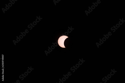 Partial Solar Eclipse Beginning Phase - Moon Entering Sun