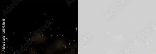 Obraz na plátne Scattered small golden sparkles and glowing stars on a black background on trans