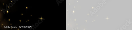 Fotografía Scattered golden starbursts glowing softly against a black background with varie