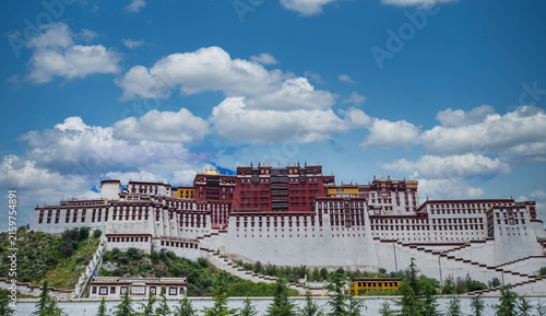 Photography Potala Palace in Lhasa, Tibet, China, under a blue sky with white clouds