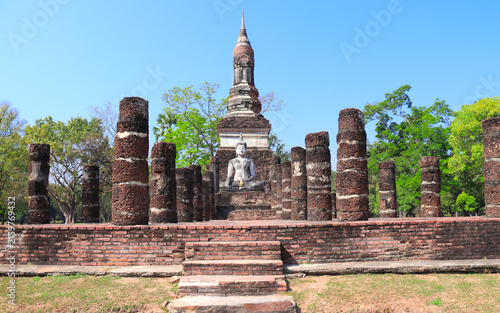 Картината върху платно Ancient stone Buddha statue, Wat Sa Si temple, Sukhothai historical park