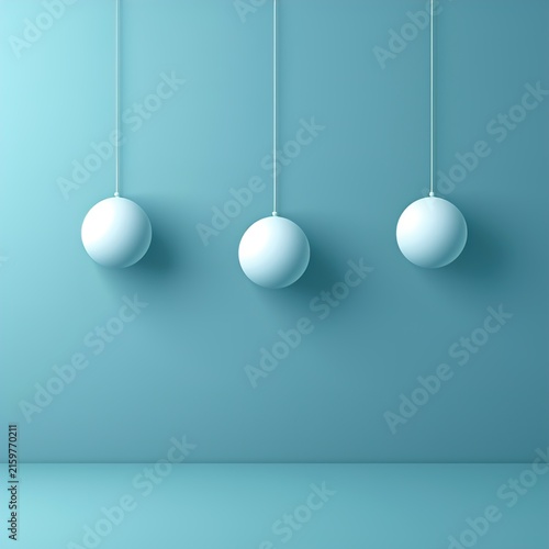 Three hanging spheres on blue background