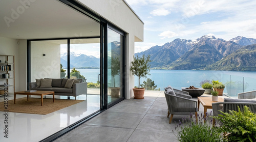 Modern home with stunning mountain and lake view, spacious patio