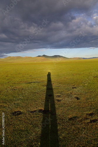 Human Shadow Across the Mongolian Steppe at Sunrise in Tsagaan, Arkhangai Province