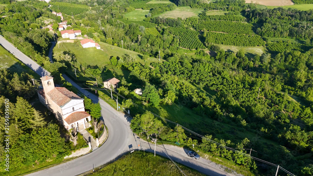 Naklejka premium Aerial View of a Historic Church in Piedmont Italy Countryside