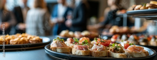 Appetizers on a serving platter at a business event in a modern setting  