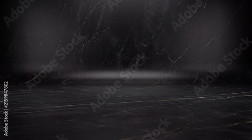 Empty black marble studio background with soft lighting for product display