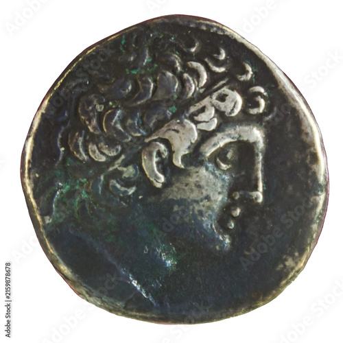 Ancient Greek silver coin featuring profile of a young King Ptolemy with curly hair